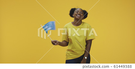 Woman waving EU flag Woman waving EU flag 61449388