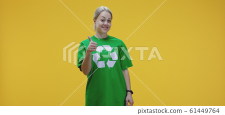 Eco-conscious woman drawing circle in air 61449764