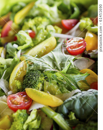 Colorful and fresh salad vertical composition Colorful and fresh salad vertical composition 61451690
