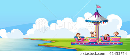 Scene with circus ride in the park and monkeys in 61453754