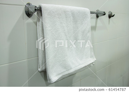 White Bath Towel Hanging on the Bathroom White Bath Towel Hanging on the Bathroom 61454787