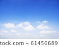 Blue sky background and white clouds soft focus, 61456689