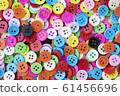 Button plastic colorful on pink background and 61456696