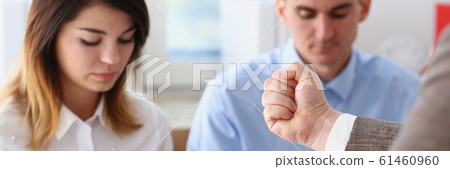 Businessman hand threatens his hired employees 61460960