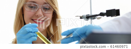Technician hold in arms in protective gloves 61460971