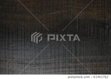 A wet black lumber wood with saw scratch texture A wet black lumber wood with saw scratch texture 61461762