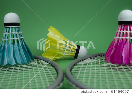 Badminton rackets and feathered shuttlecocks 61464097