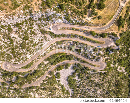 Aerial top down view of Hairbpin bend road Aerial top down view of Hairbpin bend road 61464424