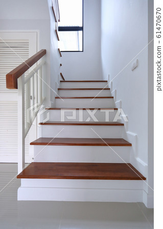 brown wooden stair and white wall in residential house brown wooden stair and white wall in residential house 61470670
