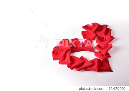 red heart shape of rose petal flower isolated on white background, image romantic love symbol 61470901
