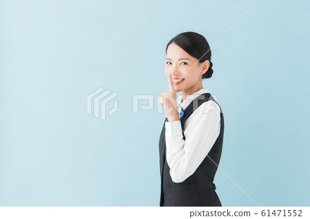 Working woman in uniform (blue background) 61471552