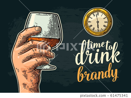 Male hand holding glass brandy and antique pocket 61475341