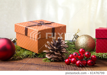 Happy Holidays. New Year or Christmas decorations with gift boxes, candles and balls. greeting card. Happy Holidays. New Year or Christmas decorations with gift boxes, candles and balls. greeting card. 61476799