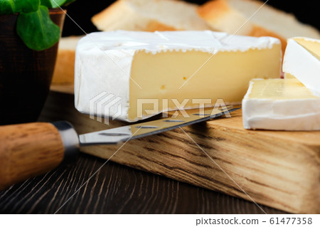 Close up of camembert or brie cheese Close up of camembert or brie cheese 61477358