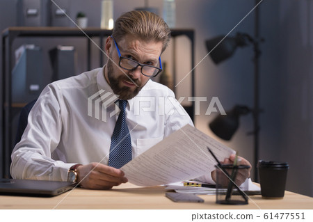 Portrait of Mature Company CEO at Work 61477551