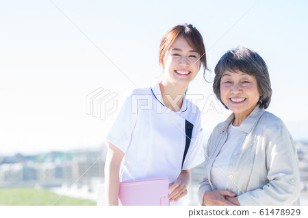 Senior woman and nurse Senior woman and nurse 61478929
