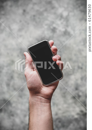 Smart cell phone in hand Smart cell phone in hand 61479630