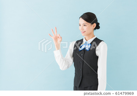 Working woman in uniform (blue background) 61479969