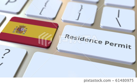 Residence Permit text and flag of Spain on the buttons on the computer keyboard. Immigration related conceptual 3D rendering 61480975