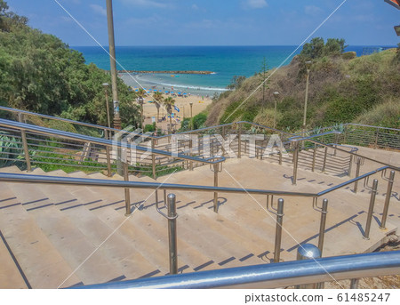 Stairs down to Netanya Beach on Mediterrranean Sea, in the resort city of Netanya. Israel 61485247