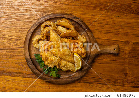 Fish and chips Typical homemade fish and chips Fish and chips Typical homemade fish and chips 61486973