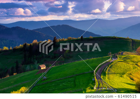 mountainous rural landscape in evening light mountainous rural landscape in evening light 61490515