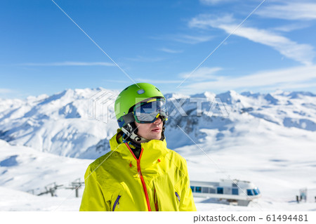 Image of sports man looking to side in mask and helmet 61494481