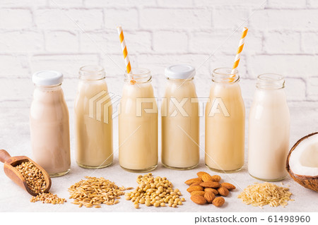 A bottles of alternative  milk and ingredient 61498960