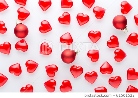 white background with red hearts pattern and red white background with red hearts pattern and red 61501522