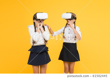 VR headset. Future education. Children schoolgirls 61502445