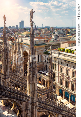 Milan Cathedral spires on background of cityscape, 61505807
