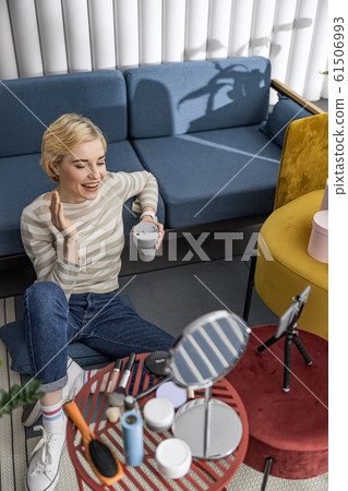 Happy young lady telling a story to the camera 61506993