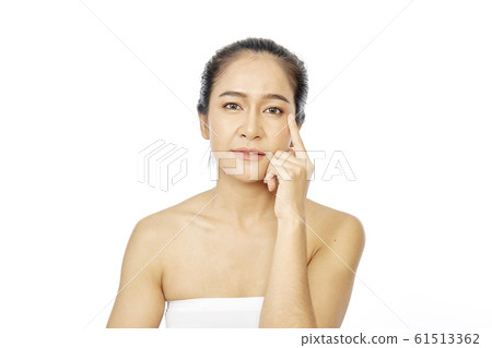 Young asian woman clean fresh skin on white Young asian woman clean fresh skin on white 61513362