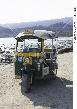 Auto rickshaw running in Aoshima, Miyazaki Prefecture Auto rickshaw running in Aoshima, Miyazaki Prefecture 61516093