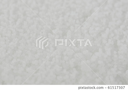 Surface of white granules Surface of white granules 61517307