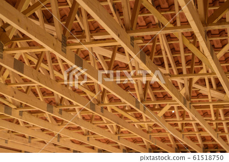 Residential construction home framing view on new house wooden under construction 61518750