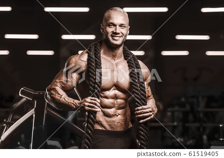 fitness athletes training using battle ropes fitness athletes training using battle ropes 61519405