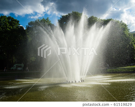 Brussels park fountain under the bright sun Brussels park fountain under the bright sun 61519829