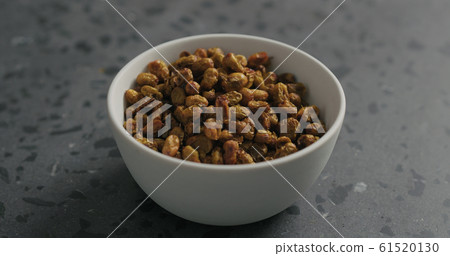 closeup dried seaberry in white bowl on terrazzo countertop closeup dried seaberry in white bowl on terrazzo countertop 61520130