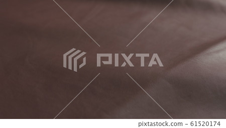 Closeup shot of brown leather Closeup shot of brown leather 61520174