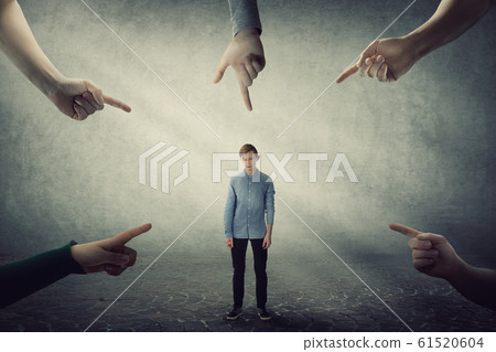 Stressed teen boy, under pressure, looking down 61520604