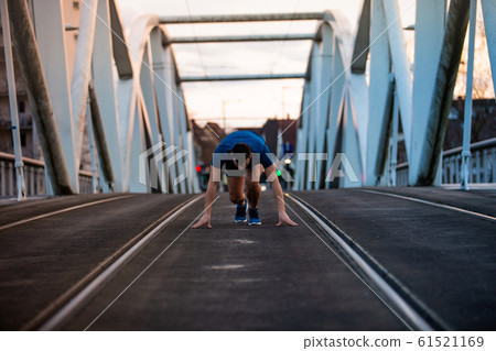 Male athlete running Male athlete running 61521169