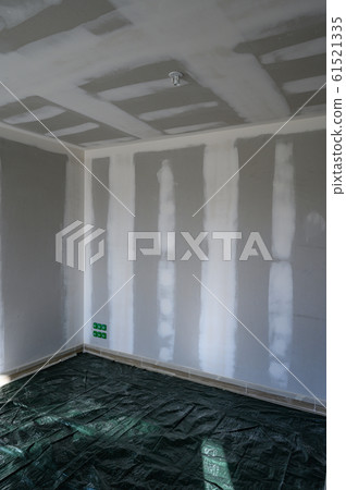 View of gypsum wall with joints at building site 61521335