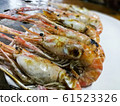 Grilled shrimp on a white plate Popular food in Thailand 61523326