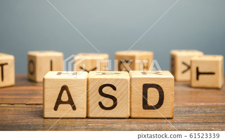 Wooden blocks with the word ASD - Autism Spectrum Disorder. Neurological and developmental disorder 61523339