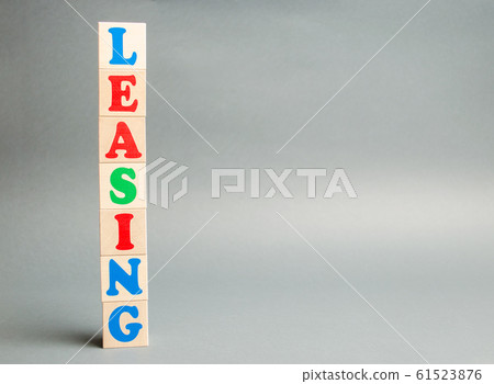 Wooden blocks with the word Leasing. Rental with repurchase rights. Acquisition of expensive goods - transport, real estate. Business and finance concept Wooden blocks with the word Leasing. Rental with repurchase rights. Acquisition of expensive goods - transport, real estate. Business and finance concept 61523876