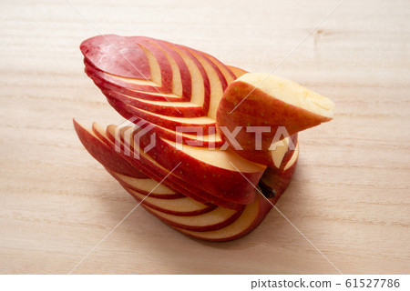 Apple swan, fruit cutting Apple swan, fruit cutting 61527786