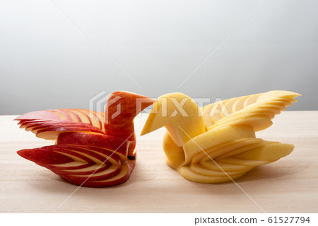 Apple swan, fruit cutting 61527794