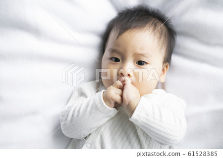 baby boy 6 month in bedroom 61528385