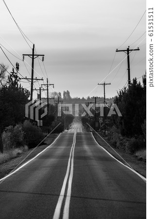 Sunset view of Lambert Road next to Smith Rock State Park in the background 61531511